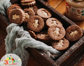 Recette Nostalgie : biscuits de No&euml;l &agrave; la p&acirc;te &agrave; tartiner chocolat blanc et noisette.